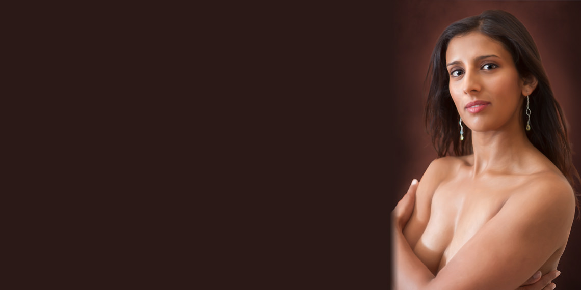 Boudoir Photo of an Indian Woman Crossing Arms - Implied Nude